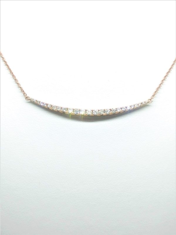 Rose 18 Karat Curved Pave Bar Necklace With 25=0.47Tw Round G/H Vs2 Diamonds
Style: Cable Link
Metal: 18 Karat
Color: Rose
Finish: Matte'
Length: 18
Clasp: Lobster