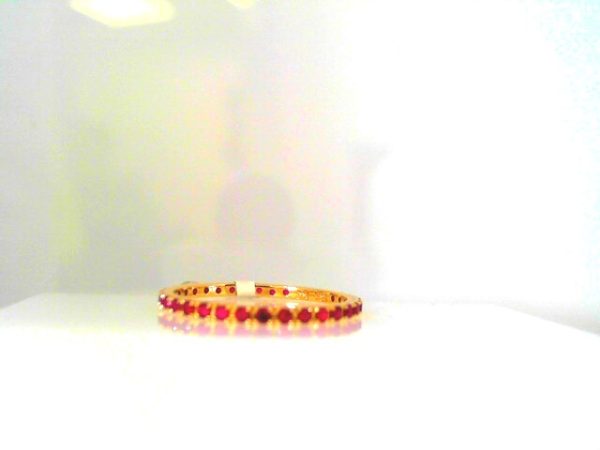 Lady's Yellow 18 Karat Eternity Fashion Ring Size 6.5 With 0.39Tw Round Rubys