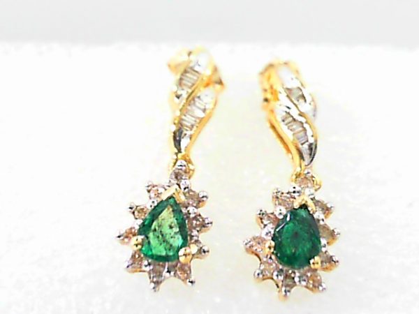 Lady's Yellow 14 Karat Drop Earrings 2= Pear Emeralds
18= Round Diamonds
4= Baguette Diamonds