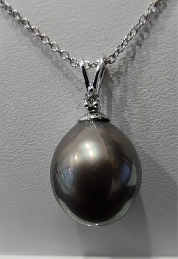 White 14 Karat Length 16- 18  inches abd one 11.00mm Tahitian Pearl
one 0.02ct Round Diamond in the bail